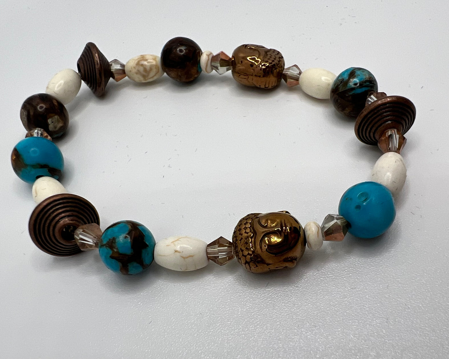 Turquoise and Bronzite Buddha stretch bracelet